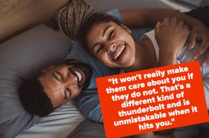 a couple in bed together laughing 