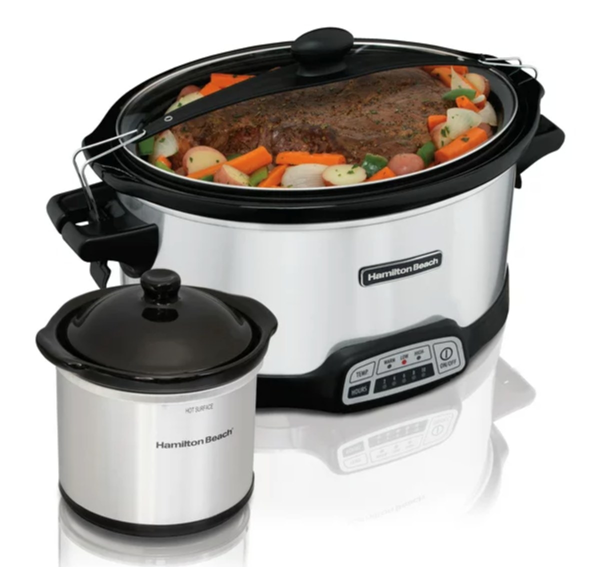 the small and large slow cookers, both silver with a black lid