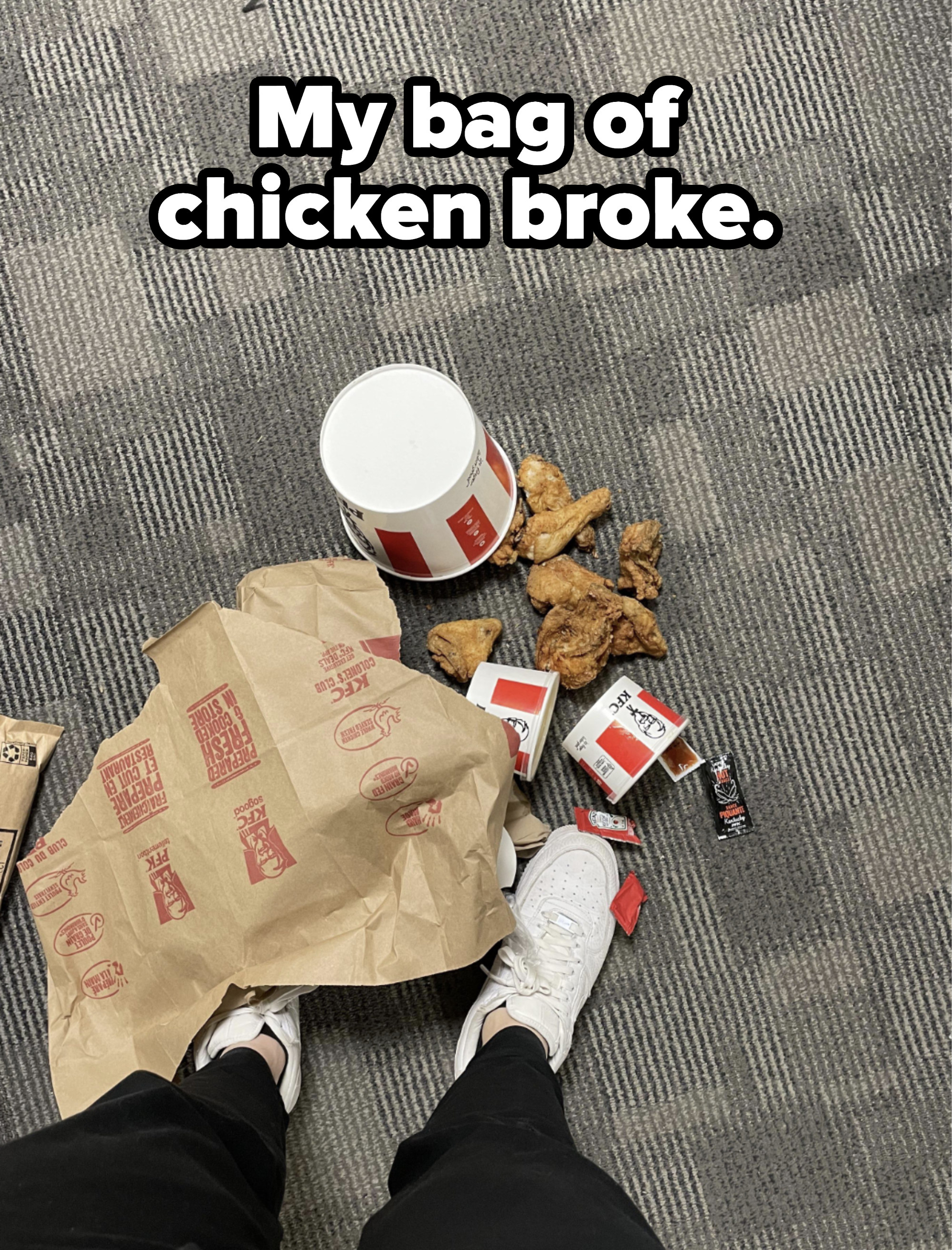 bucket of chicken on the floor