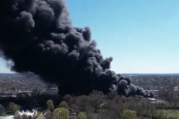 A screenshot of a video showing an industrial fire in Richmond, Indiana