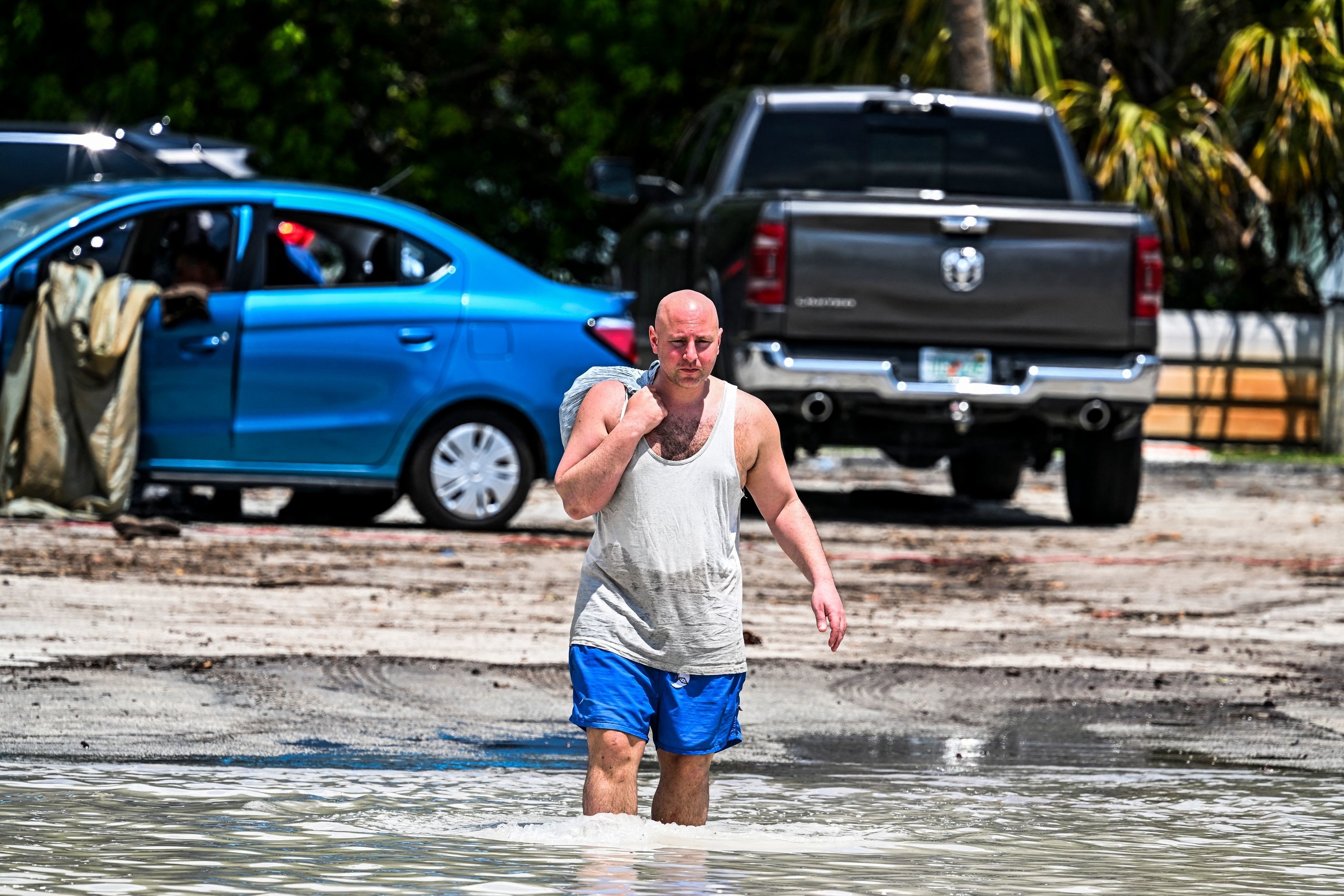 A man walking through deep water