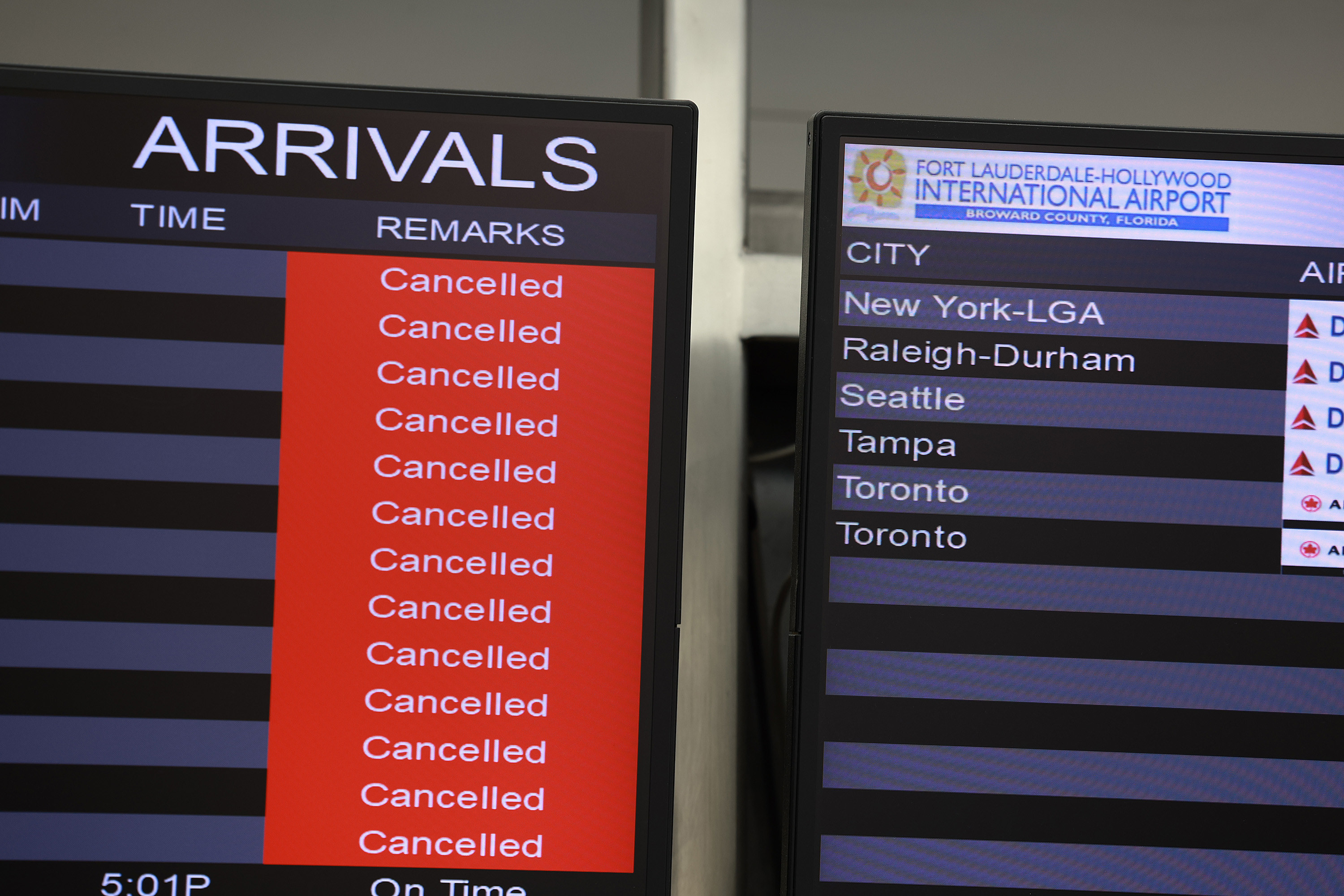 Canceled flights on the board at the airport arrivals