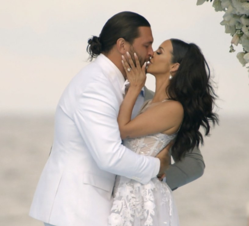 Brock and Scheana kissing at the altar of their wedding