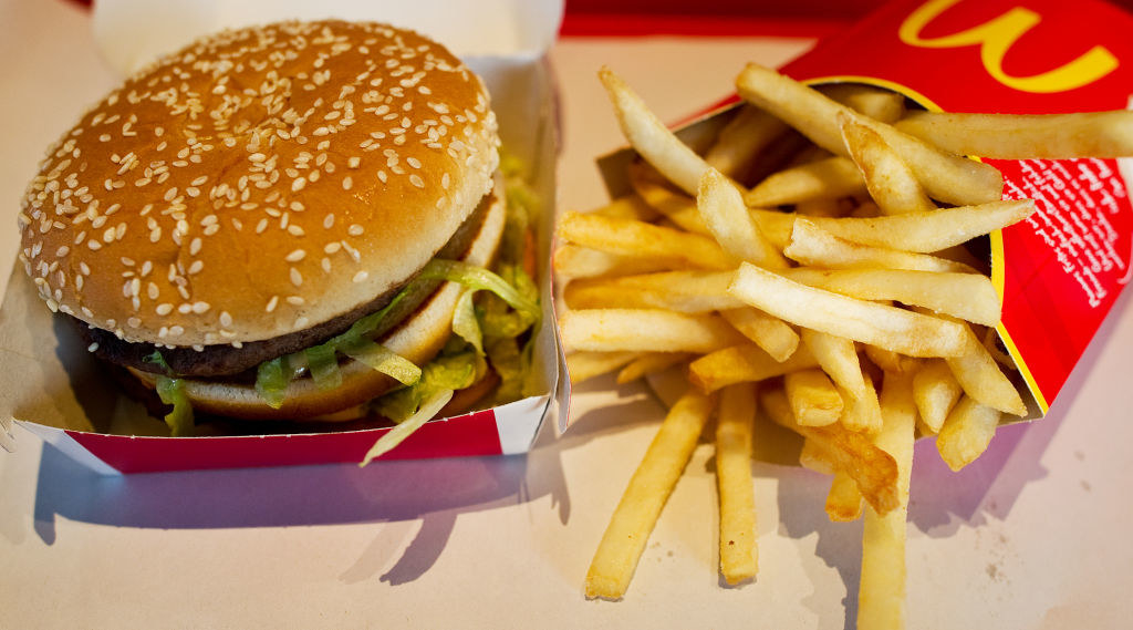 A McDonald&#x27;s hamburger and French fries.