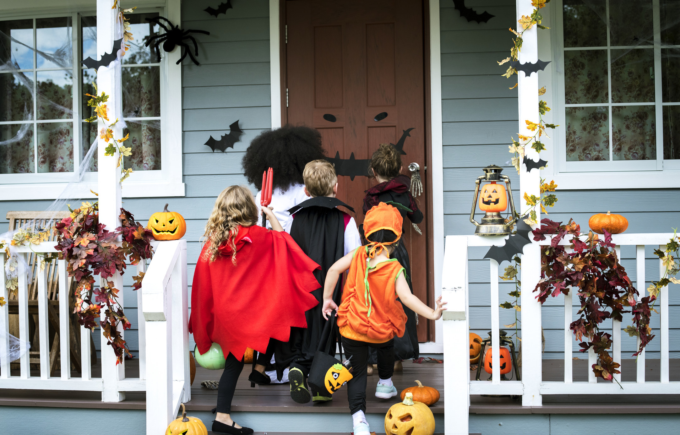 Young kids trick or treating during Halloween.