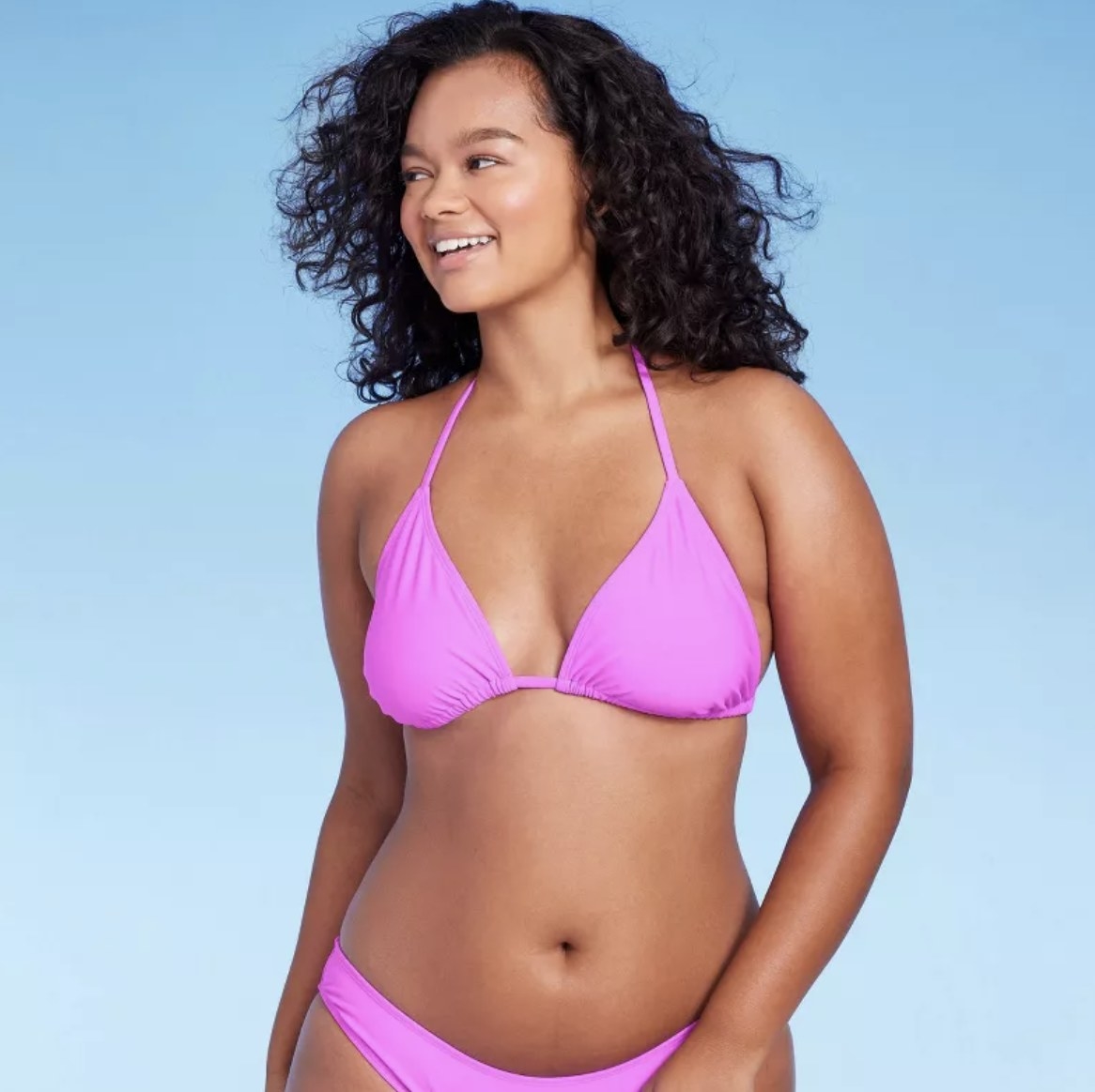 A pink triangle string bikini top