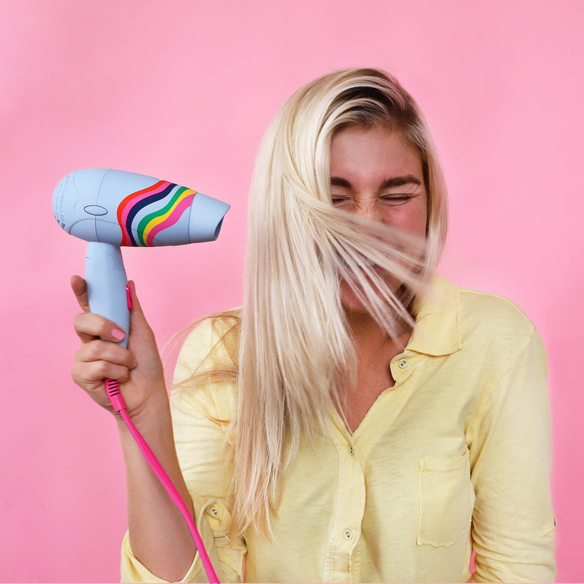 a model using the blow dryer