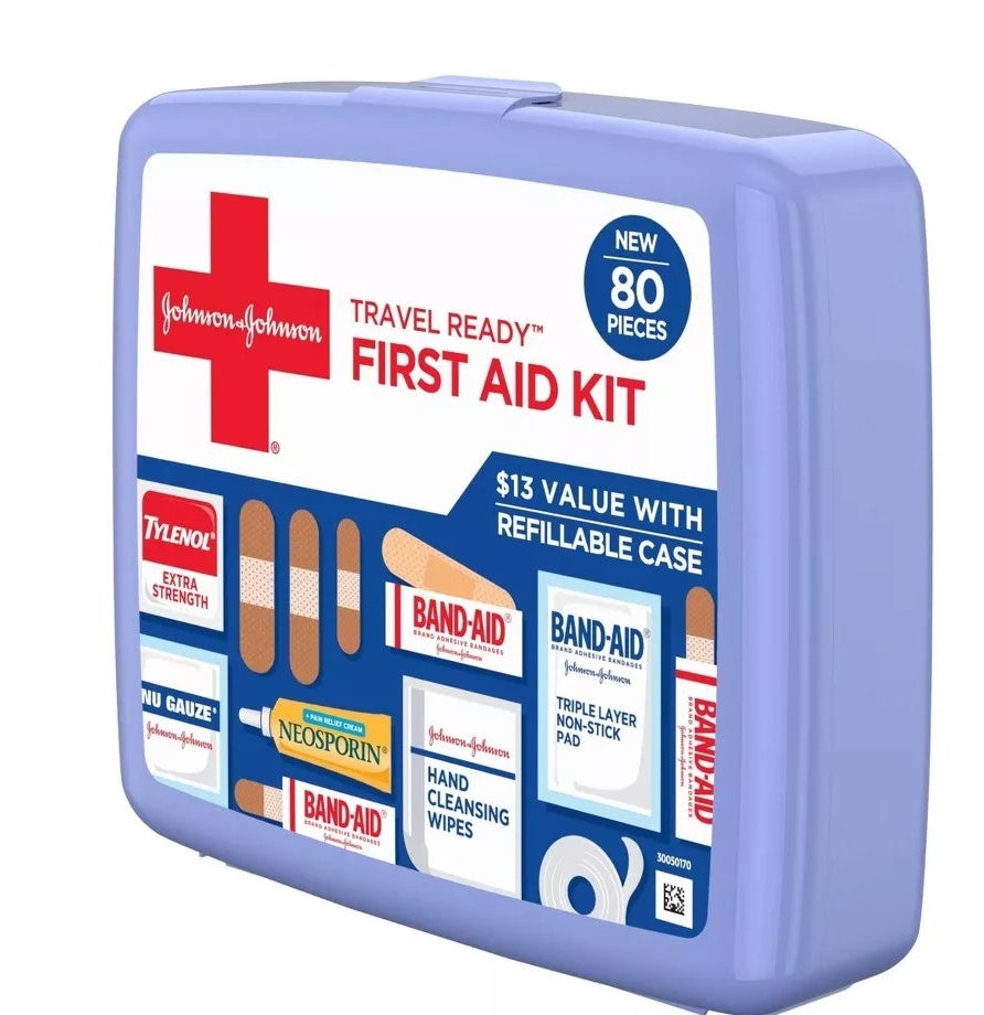 Angled photo of light purple first aid kit showing all the contents inside