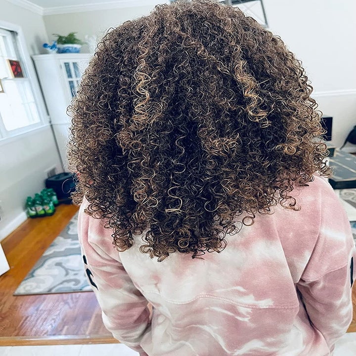 reviewers curly hair after using the detangling brush