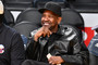 Denzel Washington photographed at an NBA game