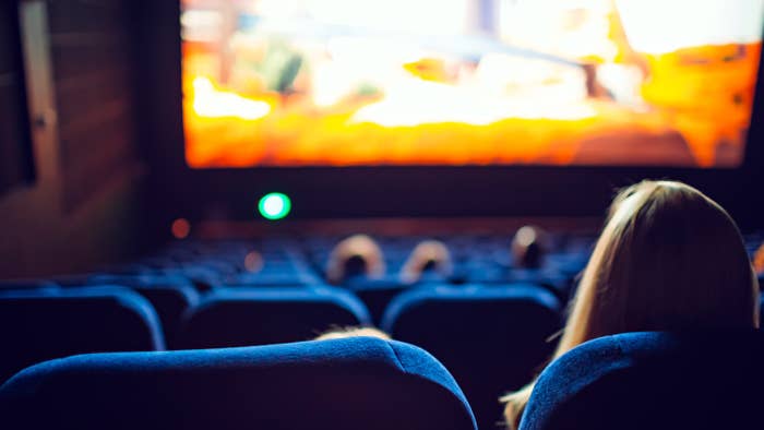 People watch a film in a movie theater