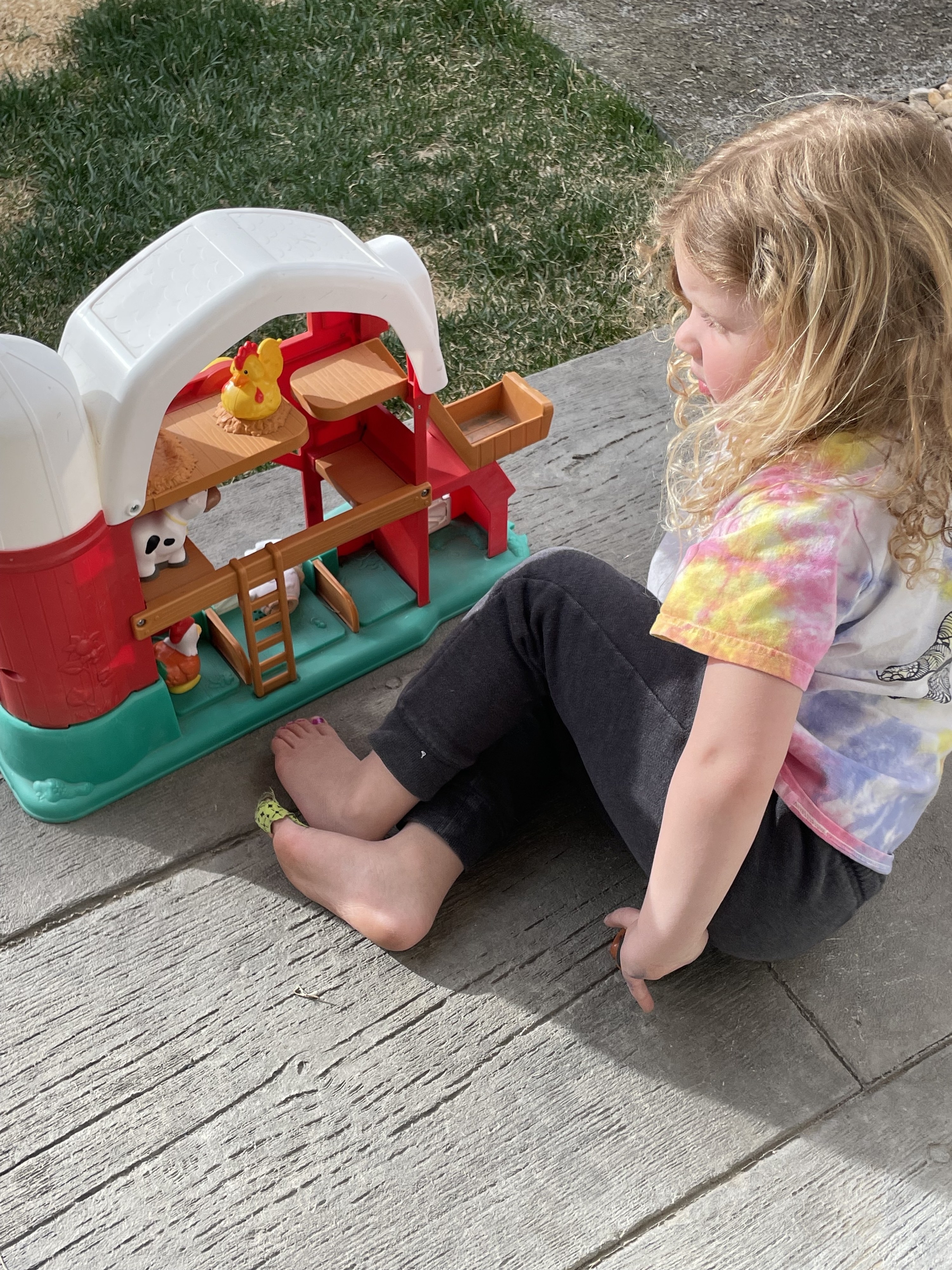 the author&#x27;s daughter playing outside
