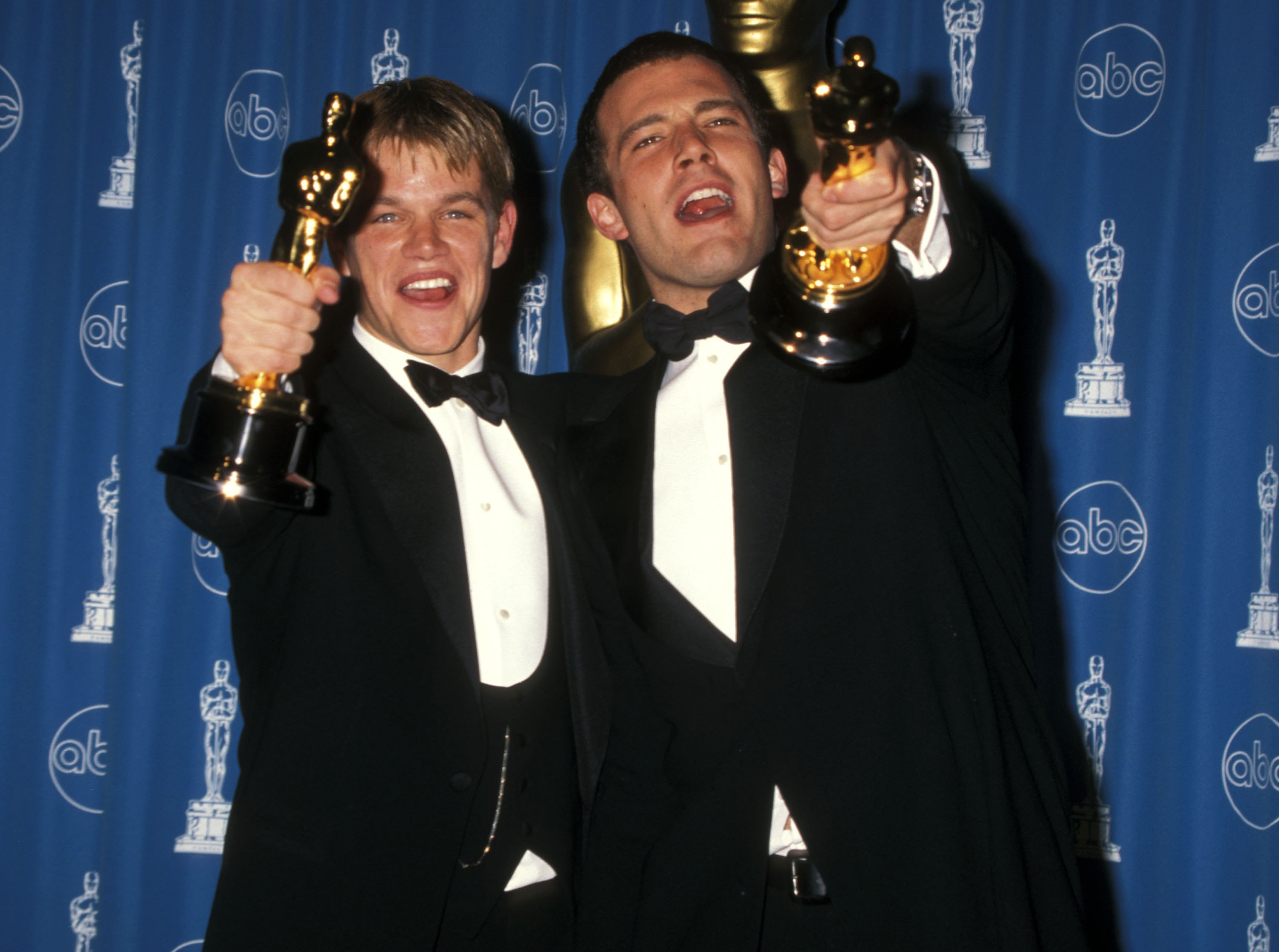 young matt and ben holding their awards