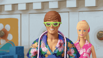 A gif of Ken from Toy Story taking off his sunglasses and saying "What!?"