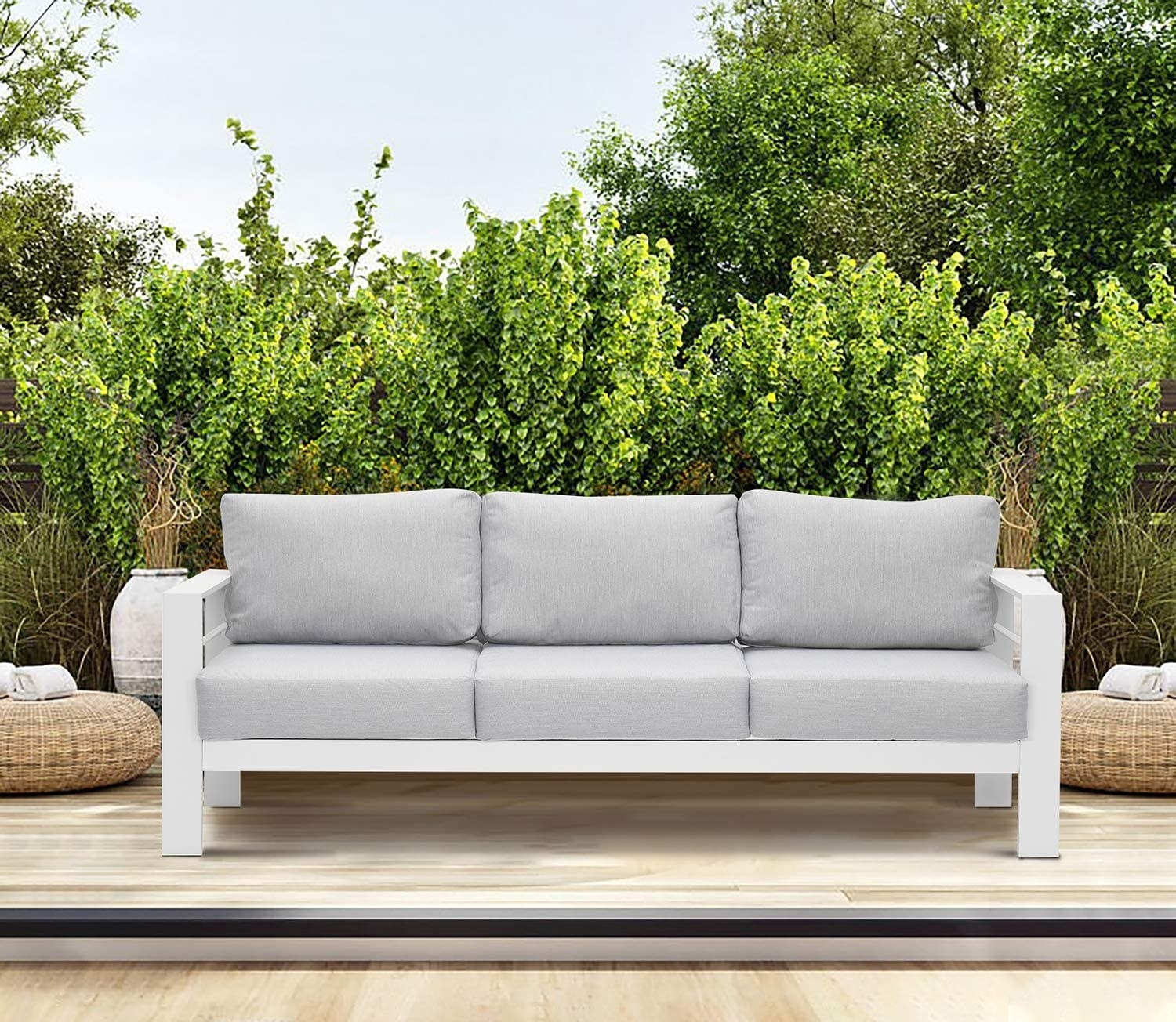 The gray and white metal sofa is shown