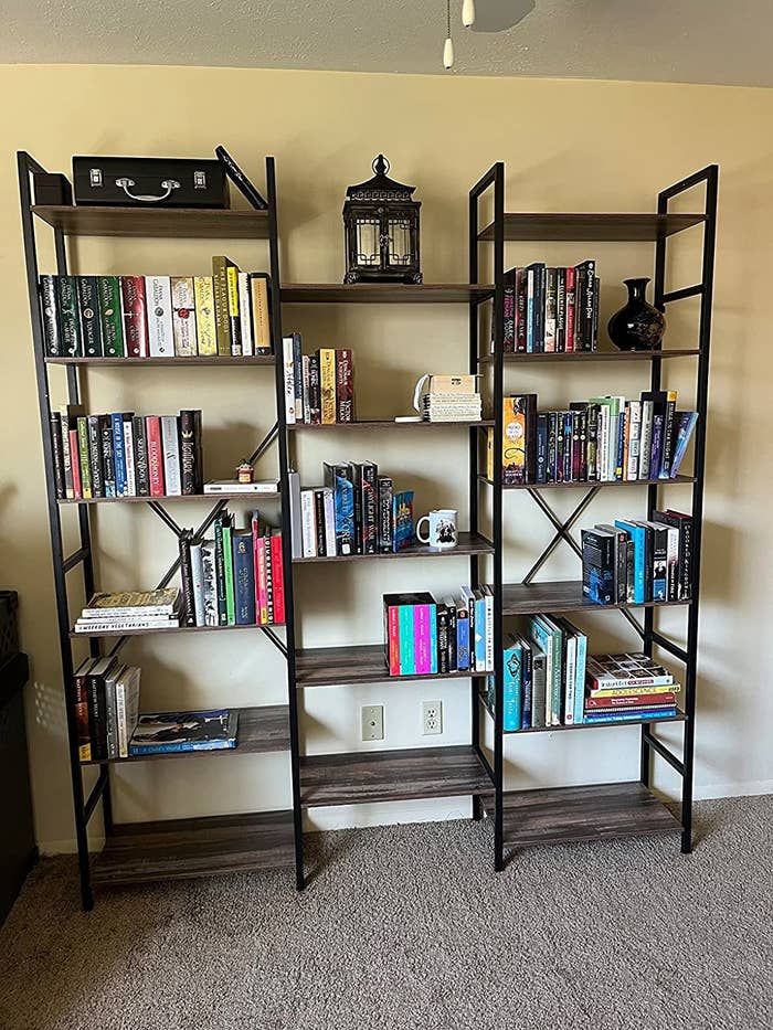 A reviewer&#x27;s photo of the large bookshelf