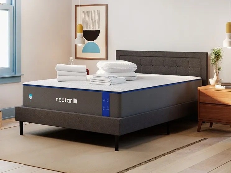 nectar sleep memory foam mattress with a bedding bundle on top