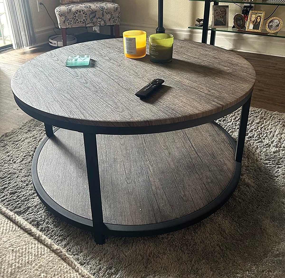 A reviewer&#x27;s photo of the round coffee table