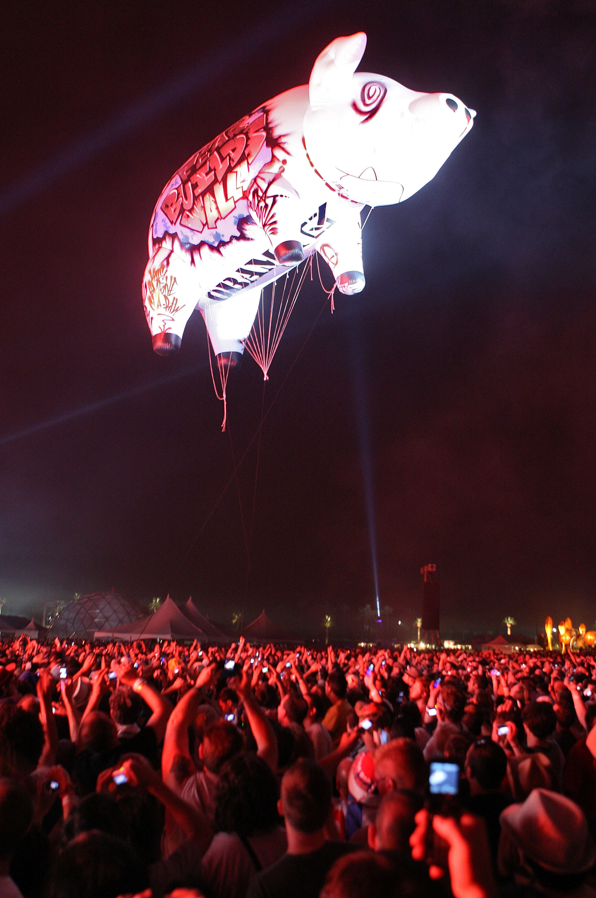 A floating pig above the crowd