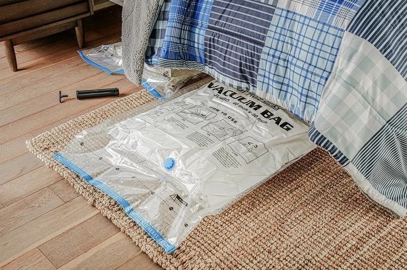 Vacuum seal bag on floor under bed