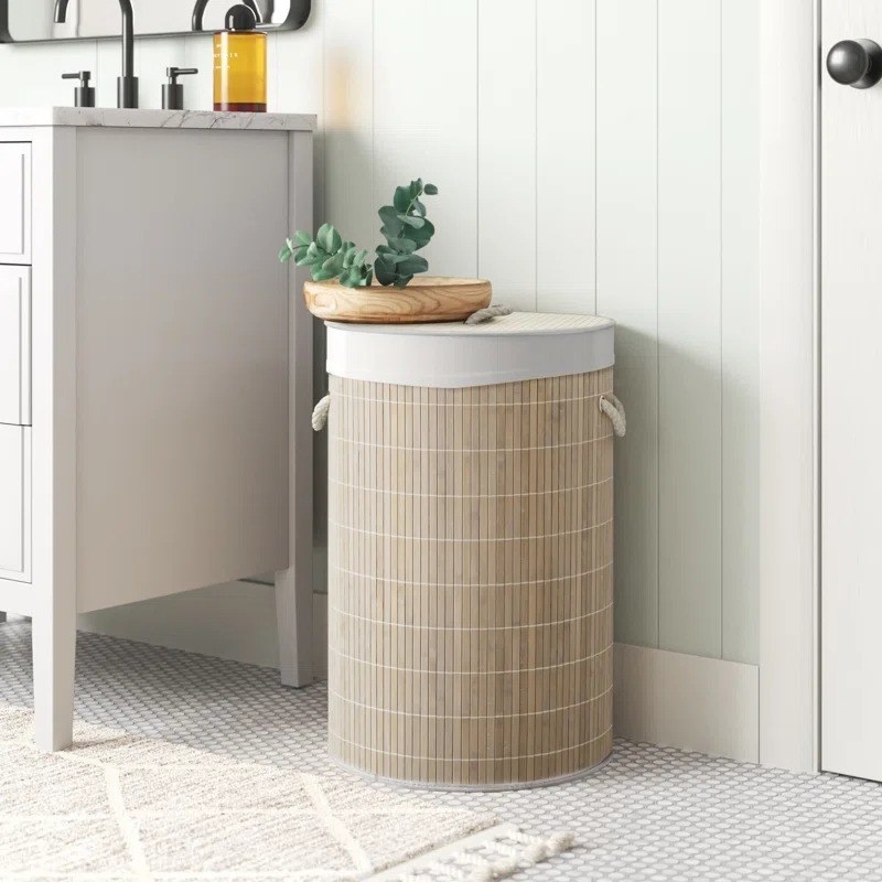 The round bamboo hamper in a bathroom