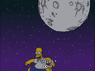 Homer Simpson being held up and taking a bite of the moon (animation).