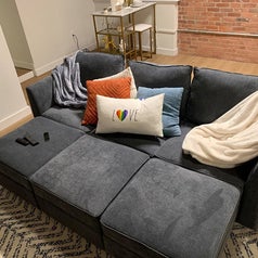 The U shape sectional converted to a bed is shown