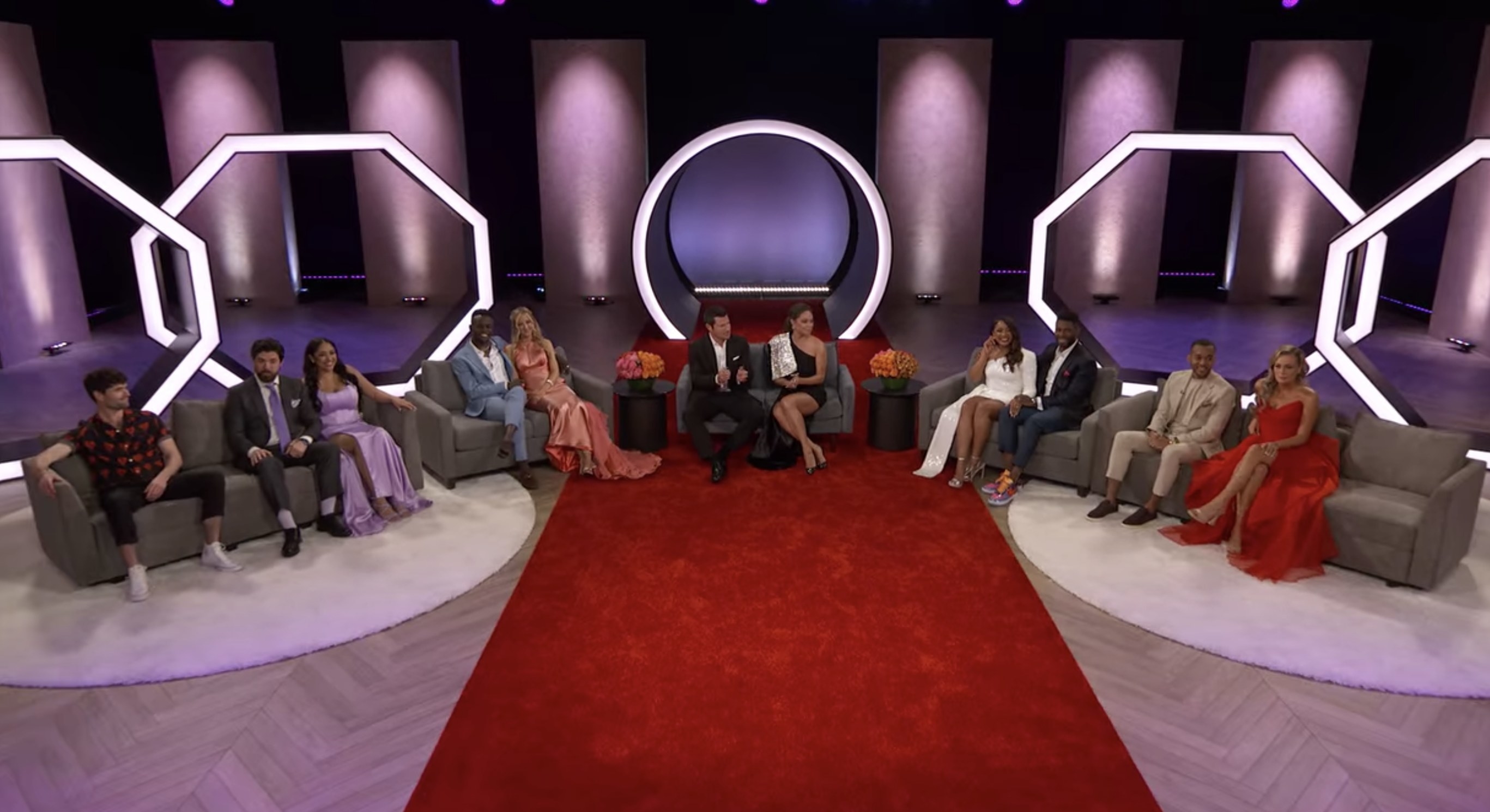 An overview of the cast sitting at the reunion