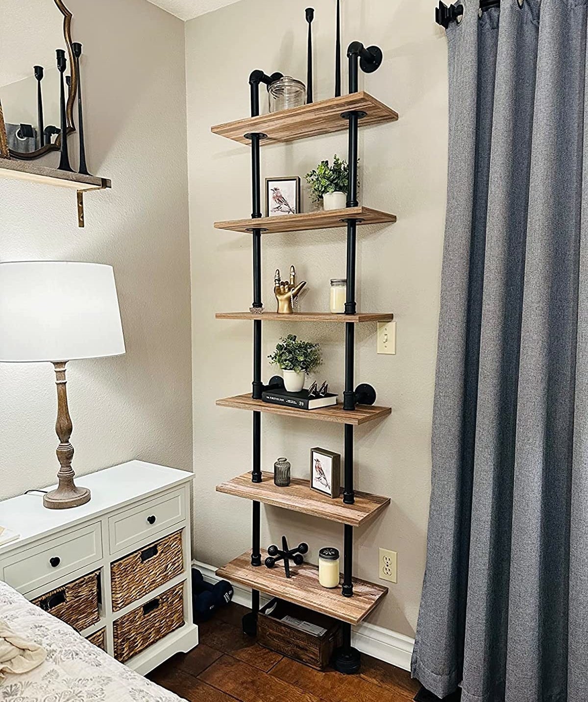 A reviewer&#x27;s photo of the industrial ladder shelf
