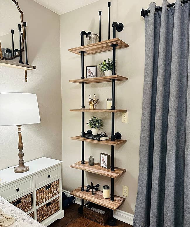 A reviewer's photo of the industrial ladder shelf