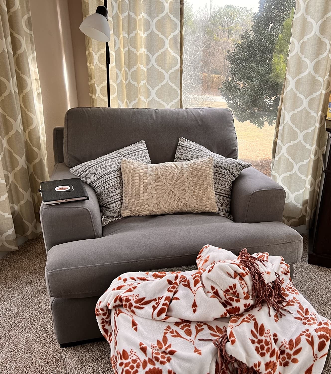 A reviewer&#x27;s photo of the armchair in the color &quot;slate&quot;