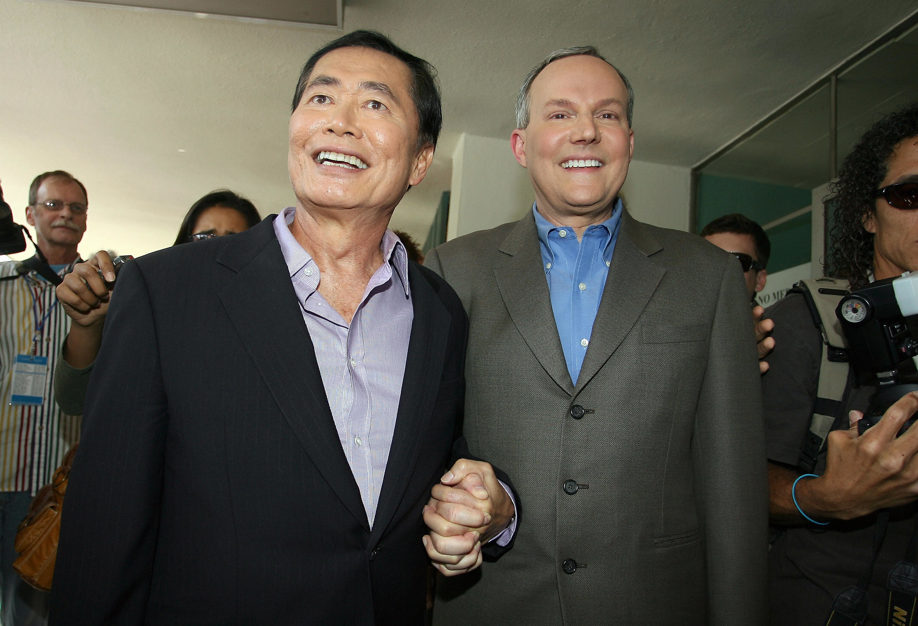 George Takei and his partner, Brad Altman, arrive at West Hollywood Park to get married in West Hollywood on June 17, 2008