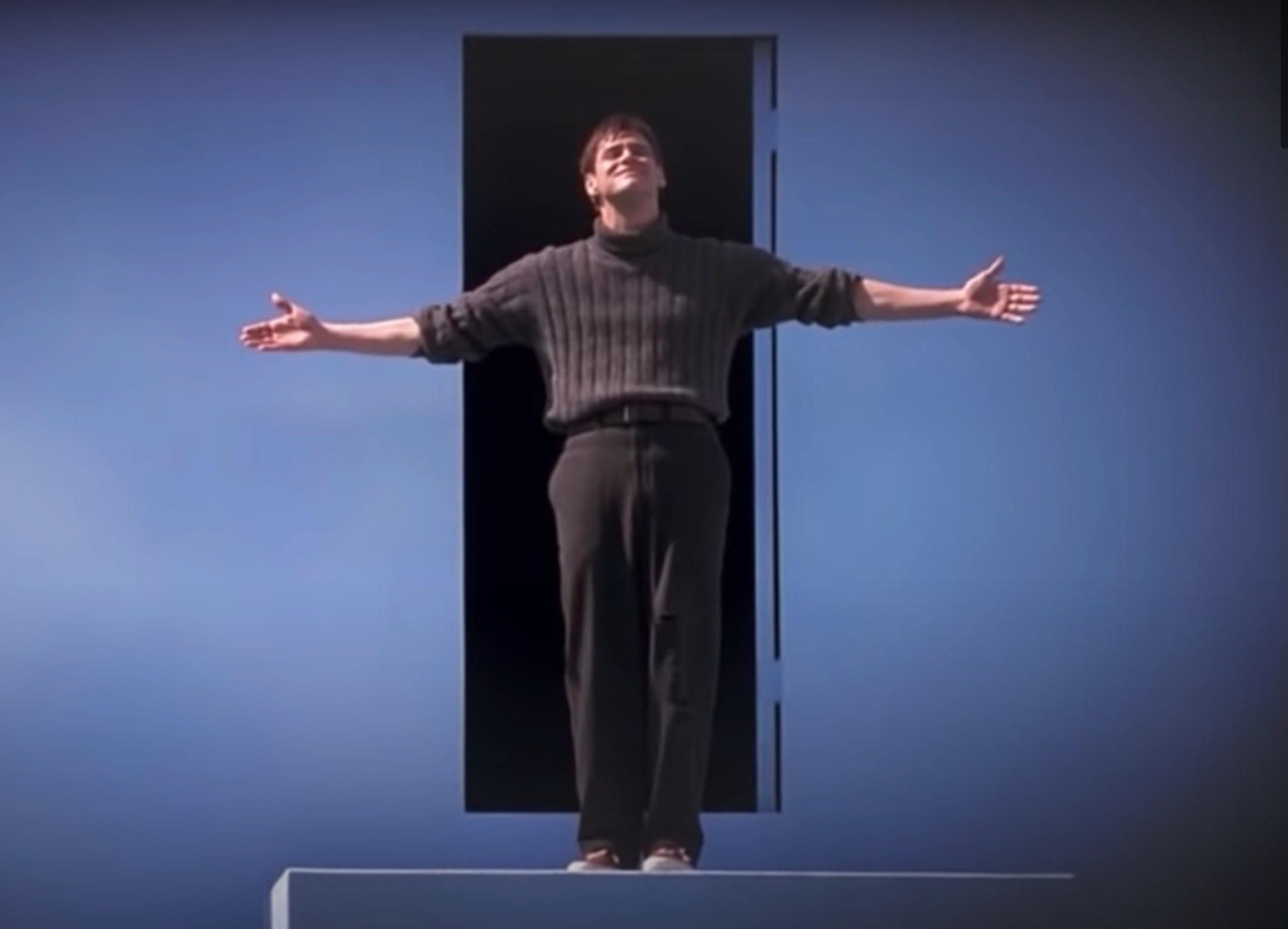 Truman finishes a bow before walking through the exit door in &quot;The Truman Show&quot;