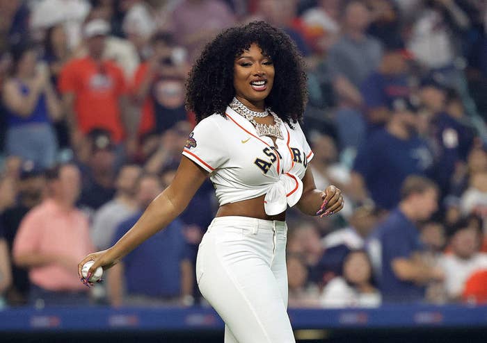 Megan smiles as she gets ready to throw the first pitch at a Houston Astros baseball game