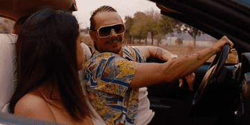 Selena Gomez and James Franco in a car driving in the movie Spring Breakers