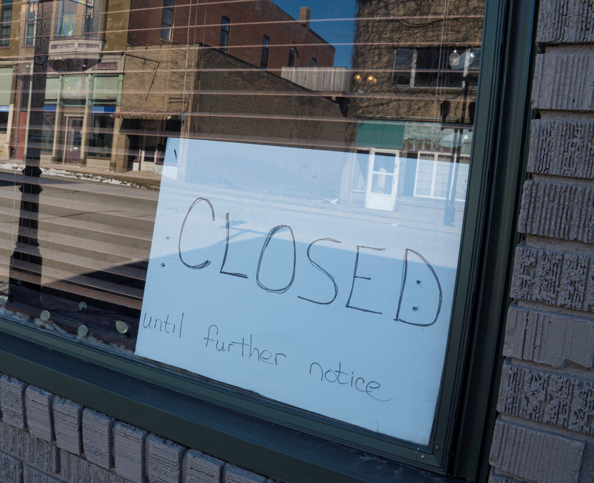 A sign saying &quot;CLOSED until further notice&quot;