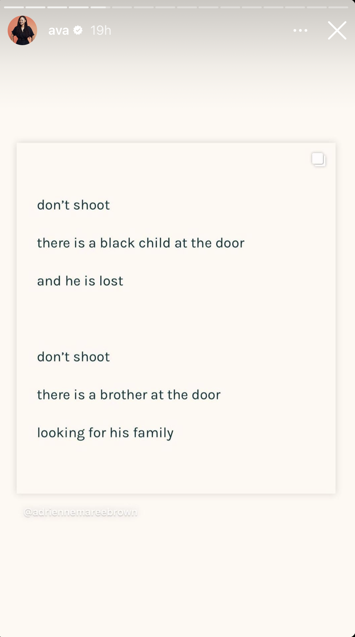 The poem reads "don't shoot/ there is a black child at the door/ and he is lost/ don't shoot/ there is a brother at the door/ looking for his family