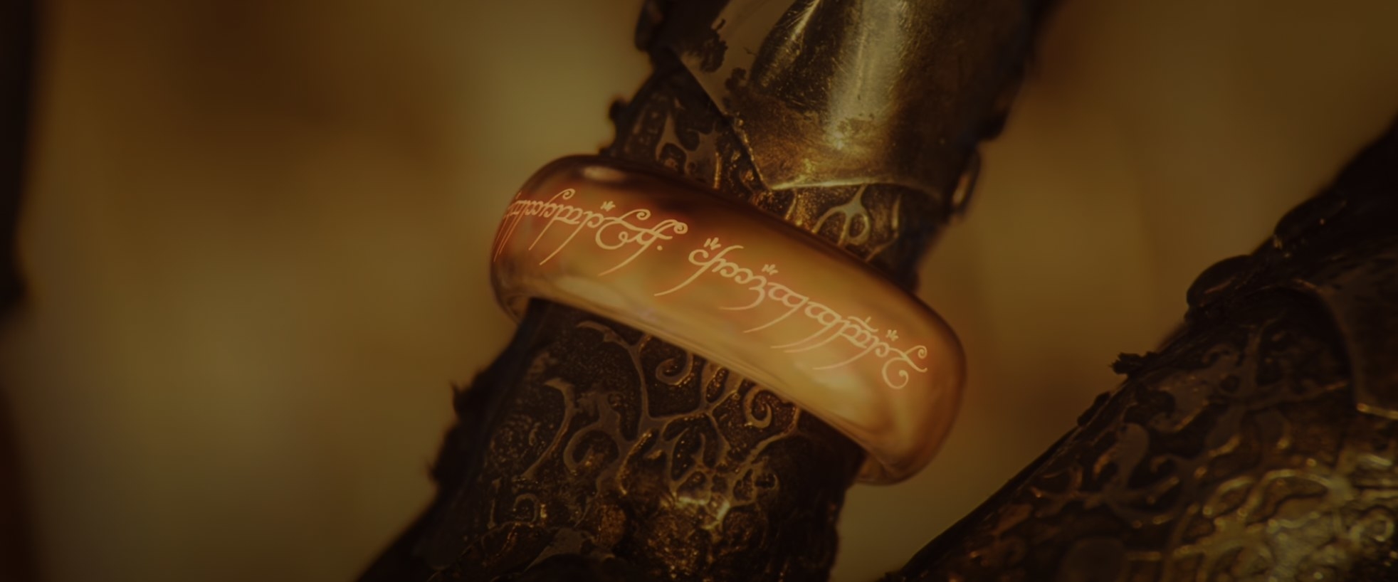 The Ring of Power glows Elvish lettering