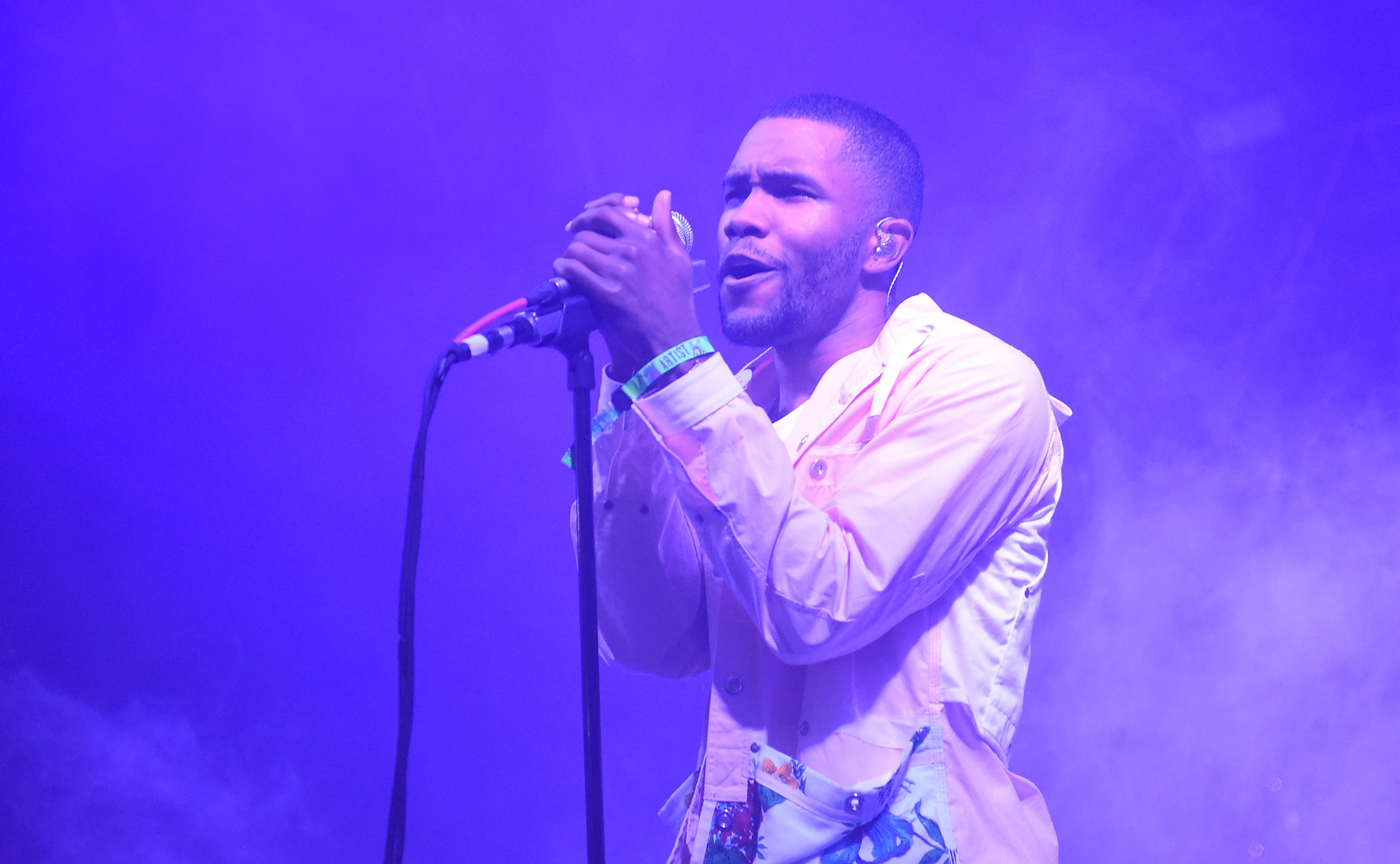 A closeup of Frank performing