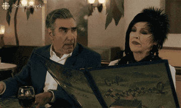 Johnny and Moira out to eat in Schitt&#x27;s Creek, Moira taking her time and Johnny saying &quot;well, I&#x27;m ready to order.&quot;