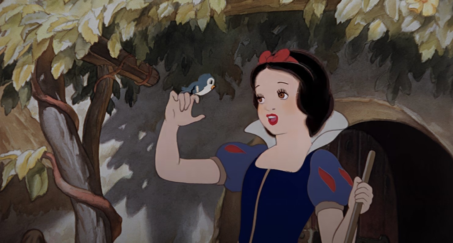 Snow White sings to a bird