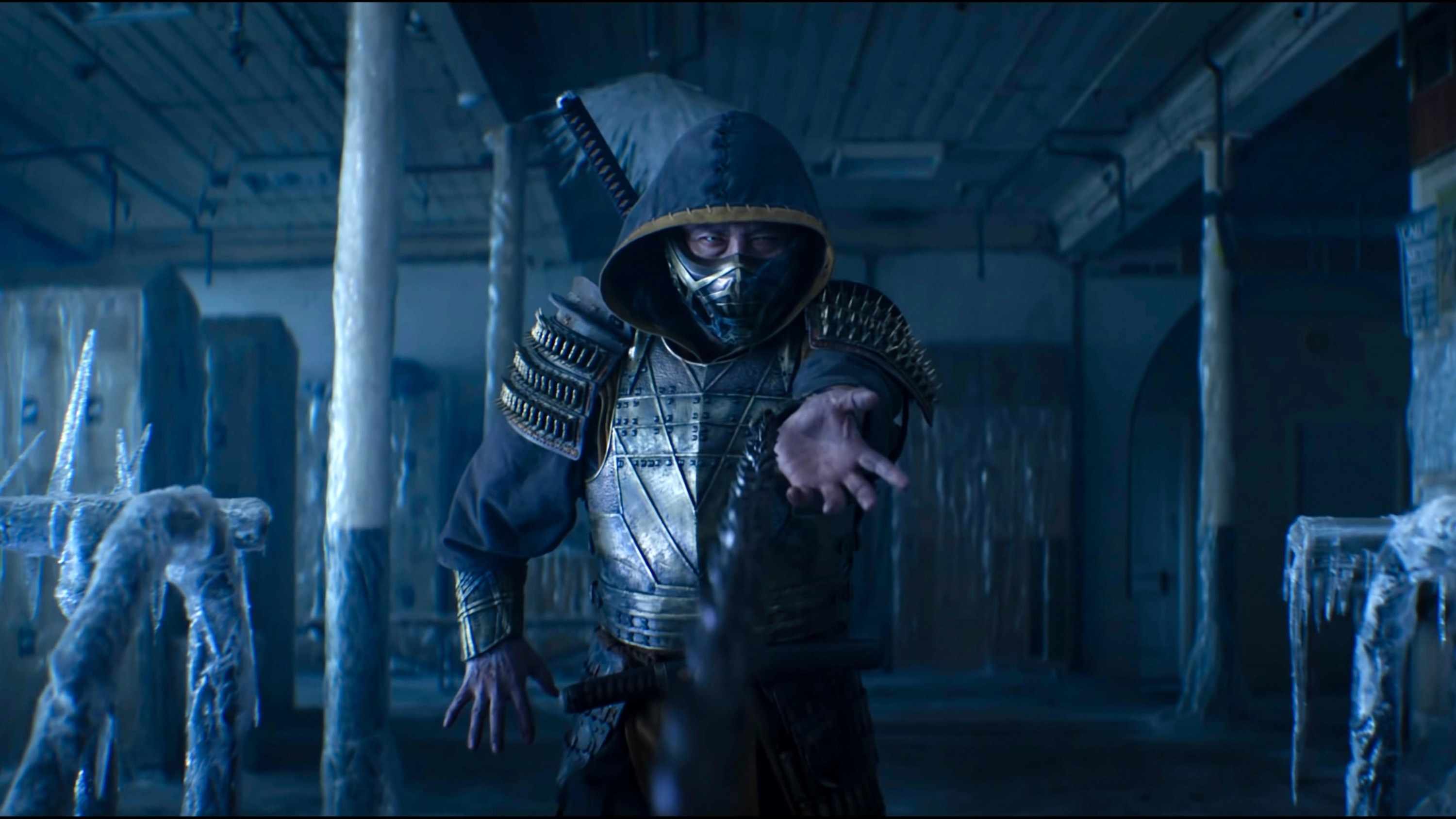 Scorpion shoots a spiked chain out of his sleeve in a frozen room