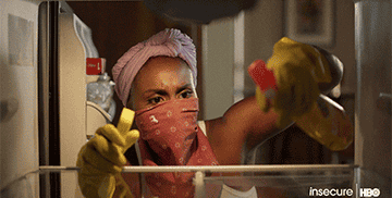 gif of character from insecure cleaning kitchen fridge