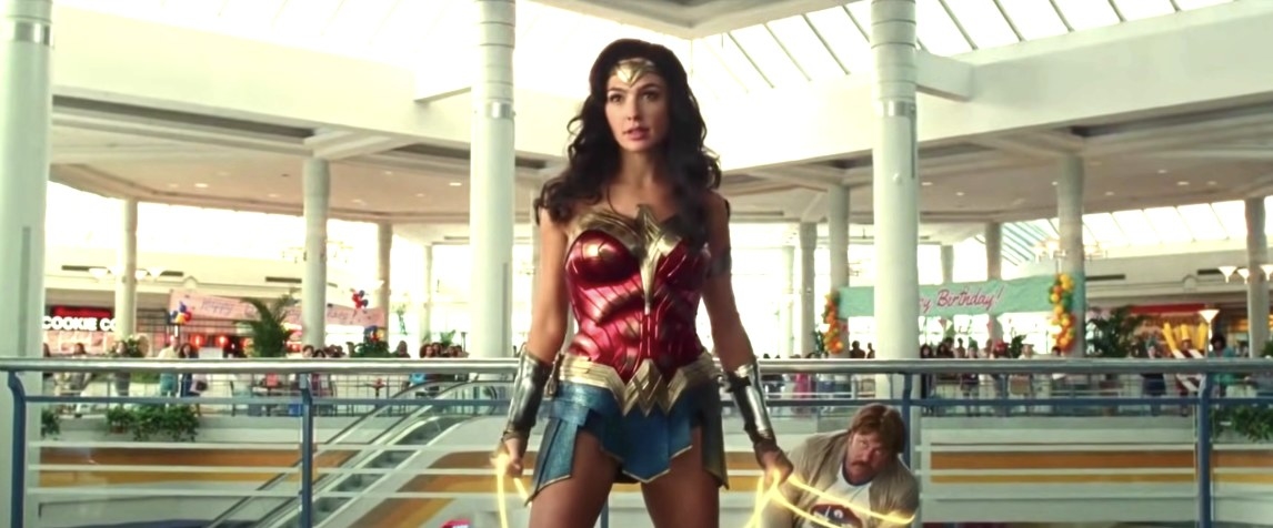 Wonder Woman lassos a man inside of a mall