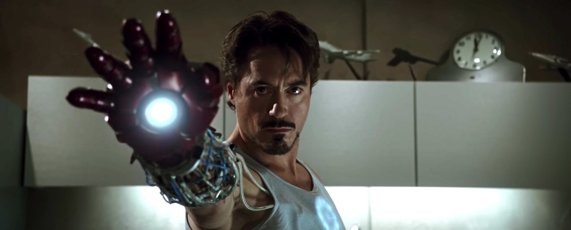 Tony Stark holds up his hand