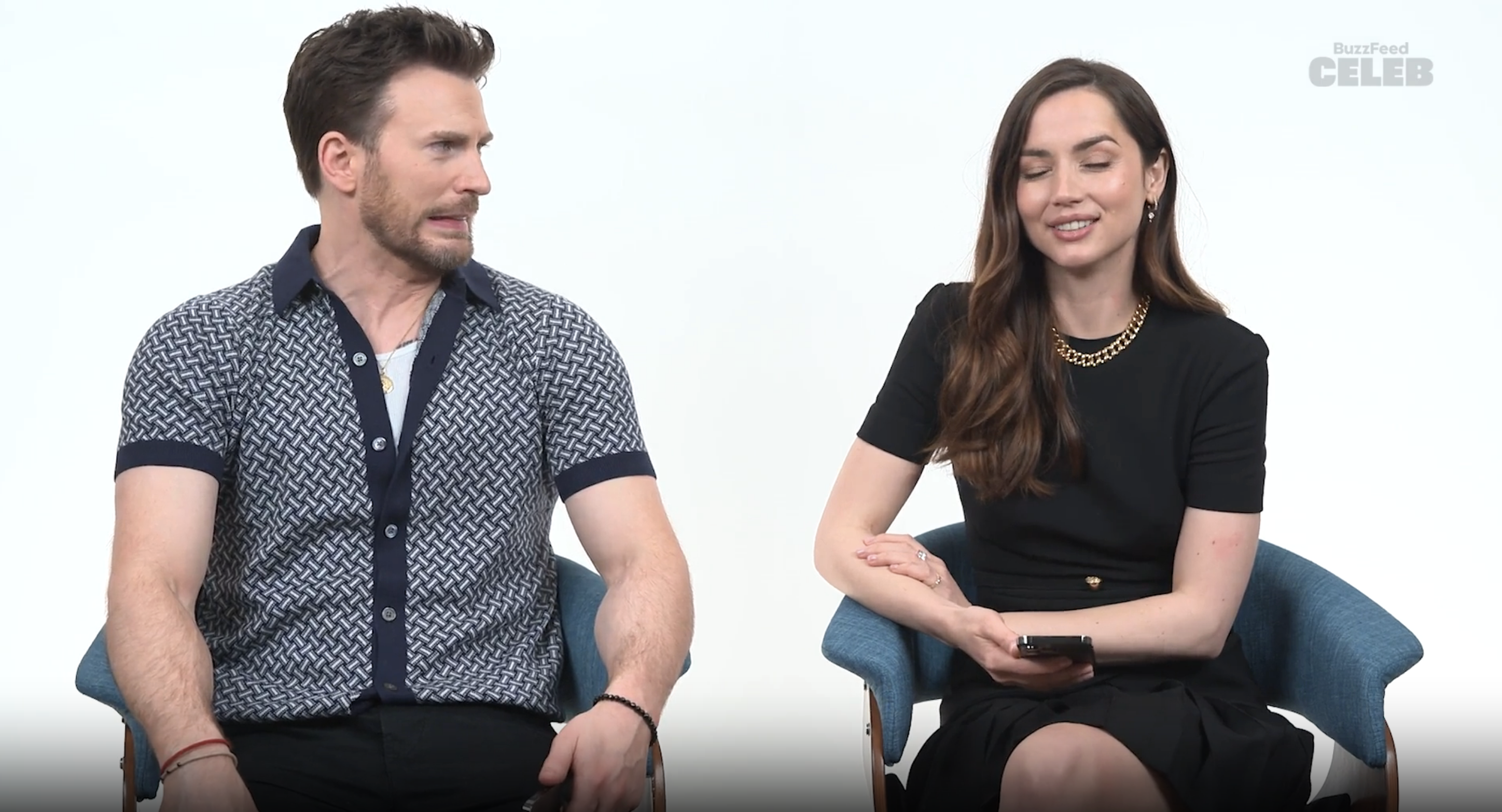 chris making a cringe face in ana's direction