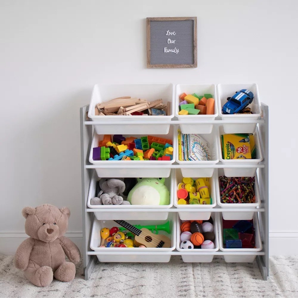 a kid's organizer holding the toys in an organizer