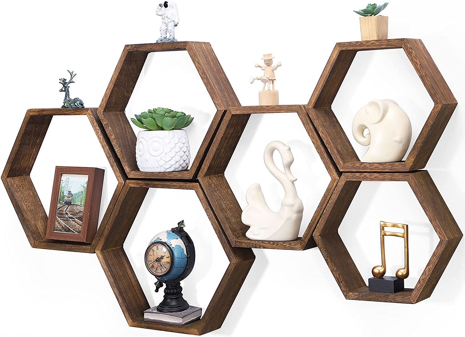 Six wooden hexagon shelves that fit together like a honeycomb