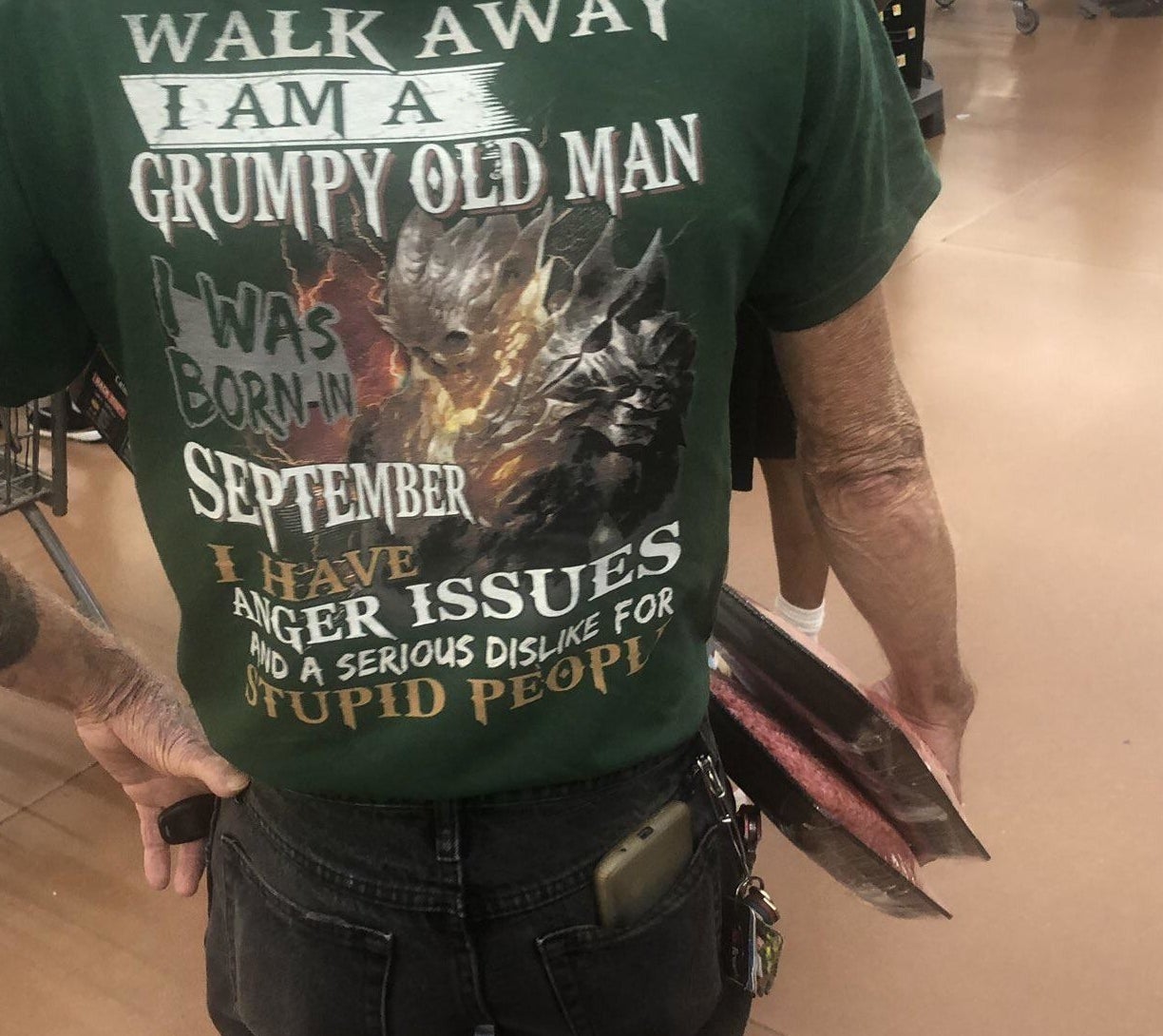 back of shirt reads, i'm a grumpy old man i was born in september, i have anger issues and a serious dislike for stupid people