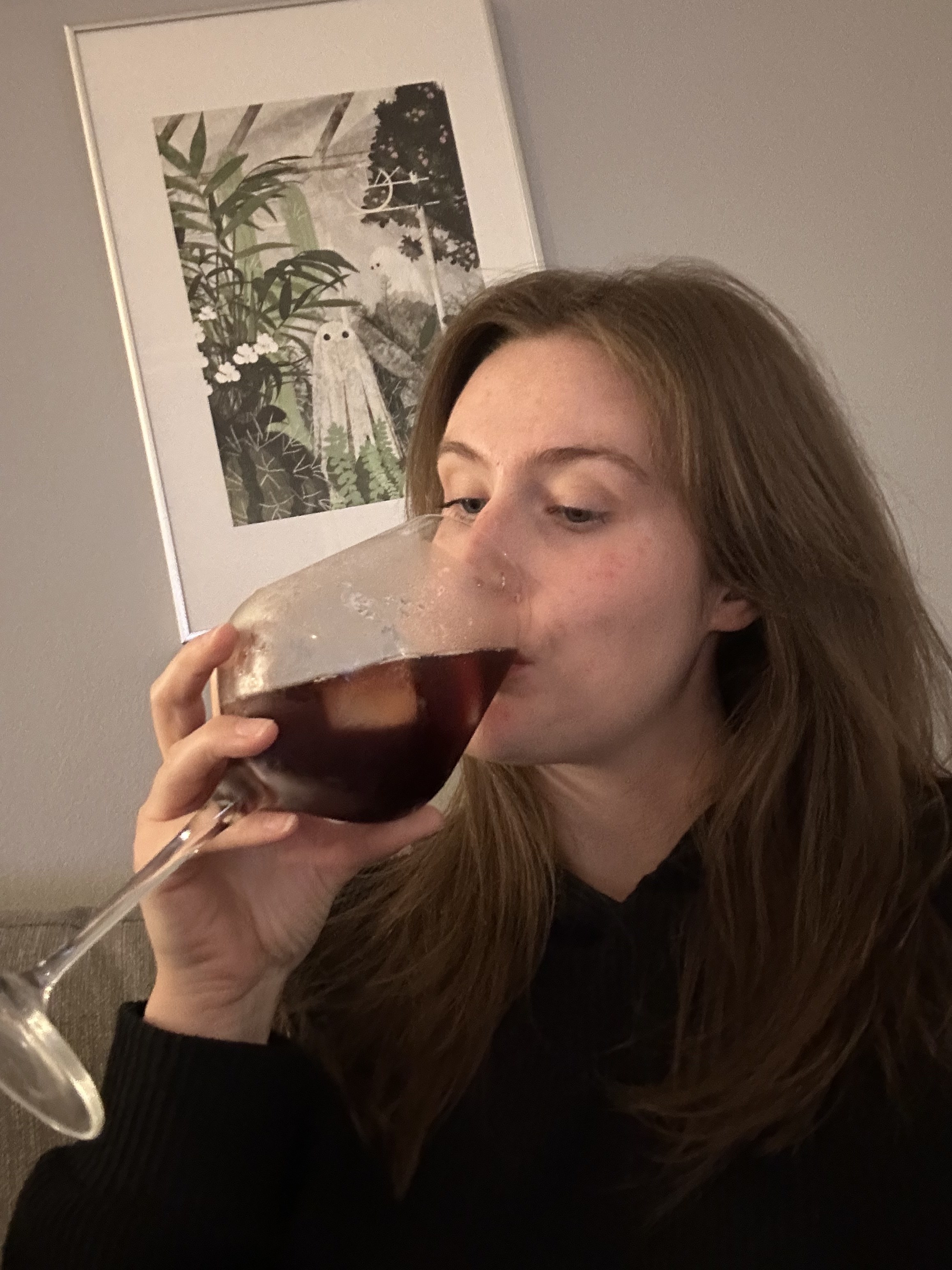 author drinking from the glass